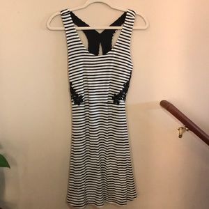Black & white striped dress w/ detailing on sides